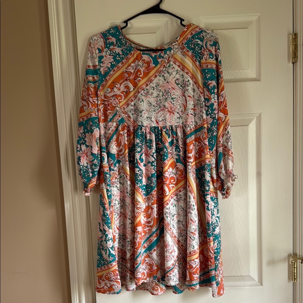 Floral Patterned Dress with Orange and Teal Accents